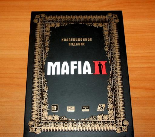 Mafia II - Мир принадлежит терпеливым. Крупный план коллекционного издания Mafia II и подарков с вечеринки Persona Grata